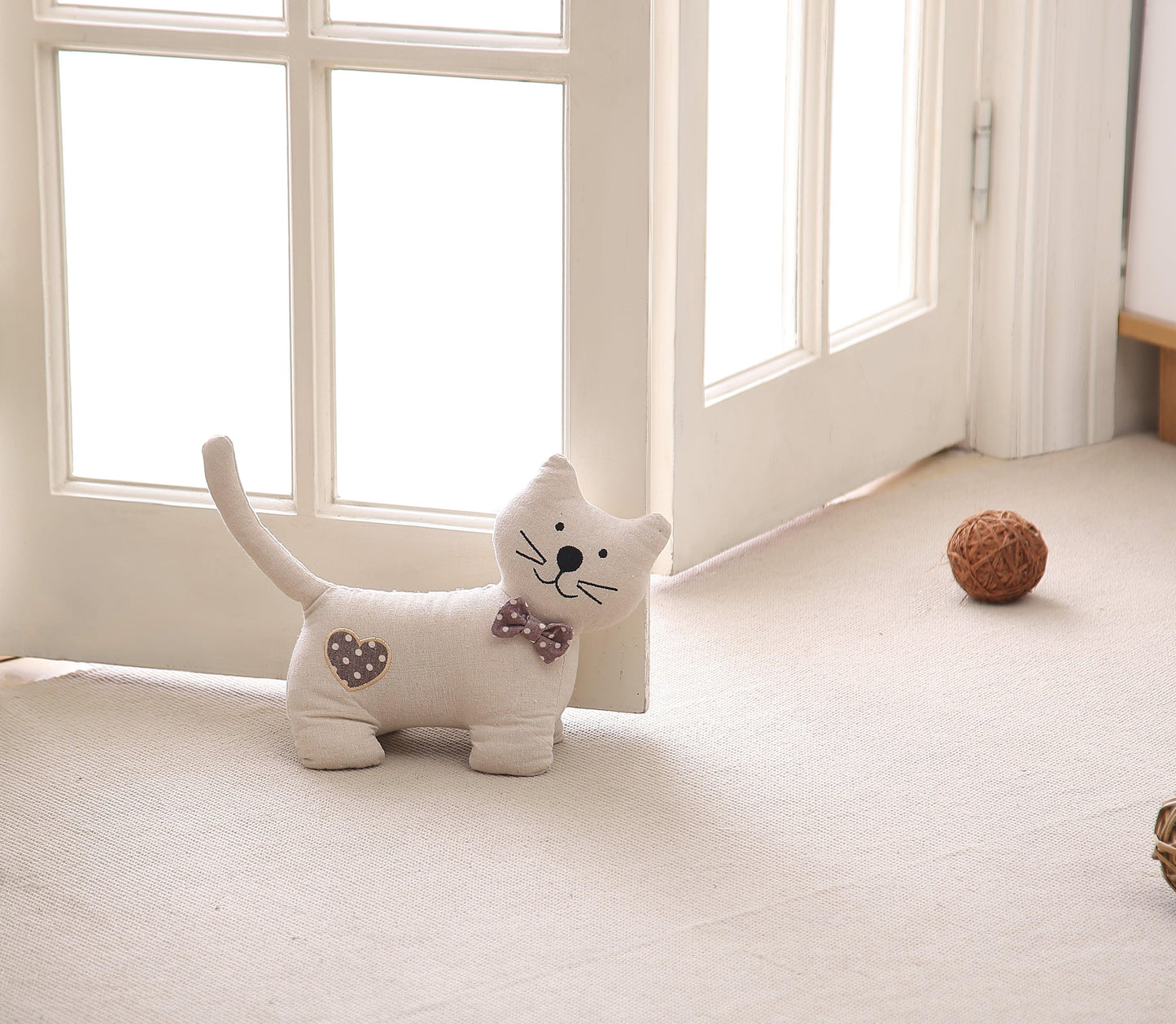 Max the Sideways Facing Cat Door Stopper - The Draft Stop